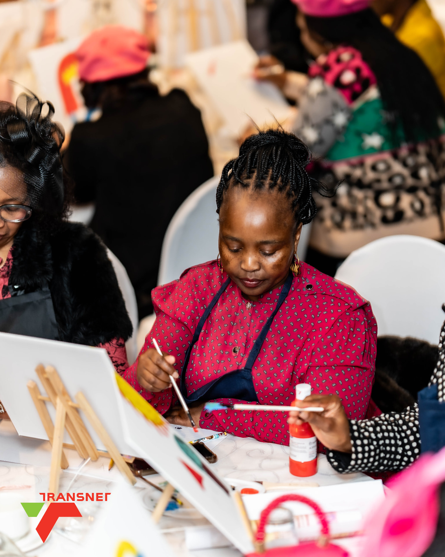 Guest painting at a corporate sip and paint event